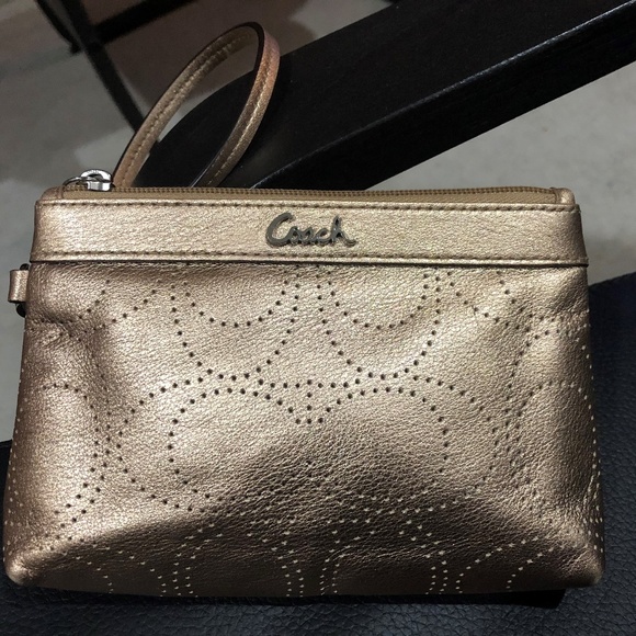 Coach Handbags - Coach Signature Perforated C Logo Wristlet